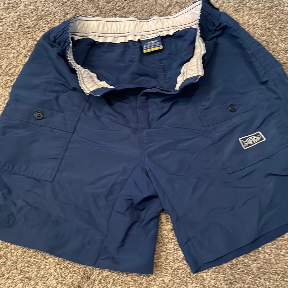 Mens AFTCO shorts size 34. Navy blue . Used .